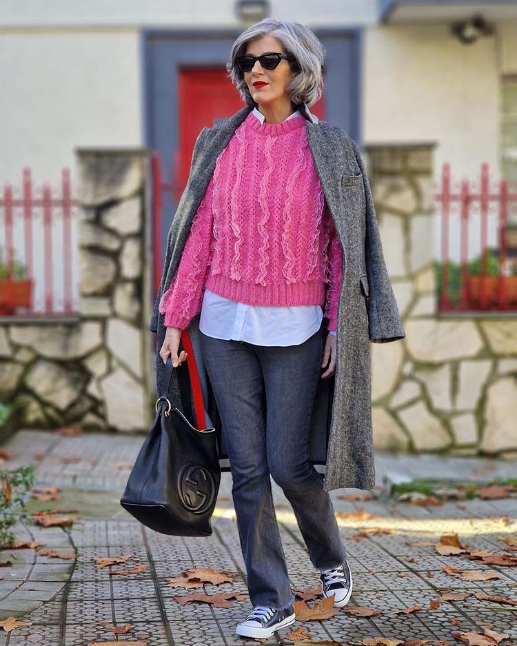 Carmen in a pink sweater and jeans | 40plusstyle.com