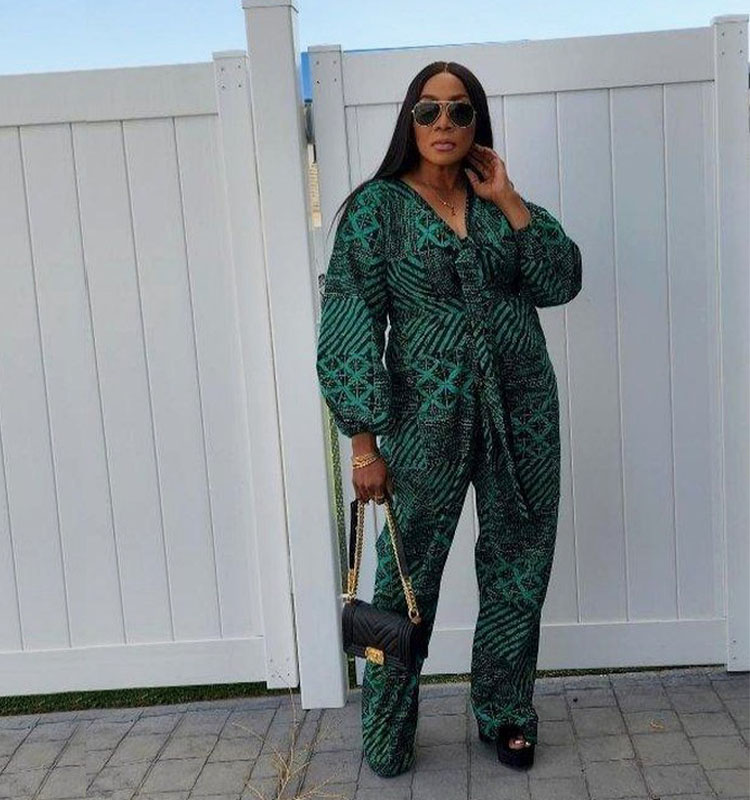 Boma in printed jumpsuit and platform sandals | 40plusstyle.com
