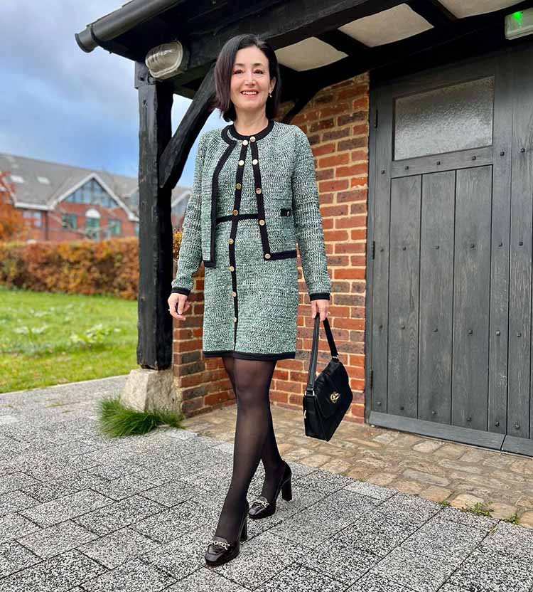 New Year's Eve outfits: Emms in knitted cardigan, dress, tights and pumps | 40plusstyle.com