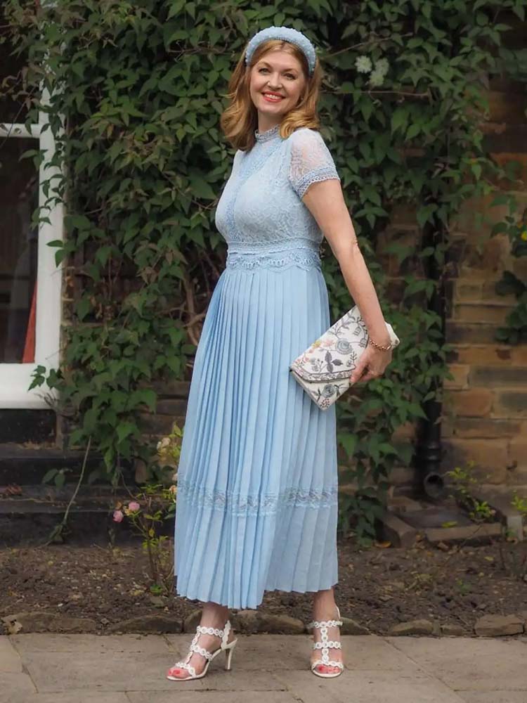 Lizzy in light blue cocktail dress fit for a wedding | 40plusstyle.com