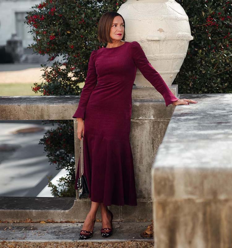 Sylvia wears a burgundy party dress | 40plusstyle.com 