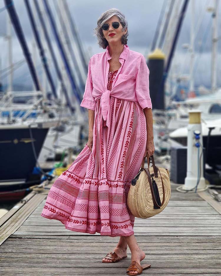 What to wear on a cruise - Carmen in a pink sundress | 40plusstyle.com