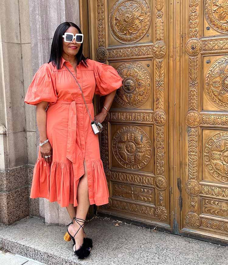 Eugenia in a puff sleeve, structured midi dress and feather sandals | 40plusstyle.com