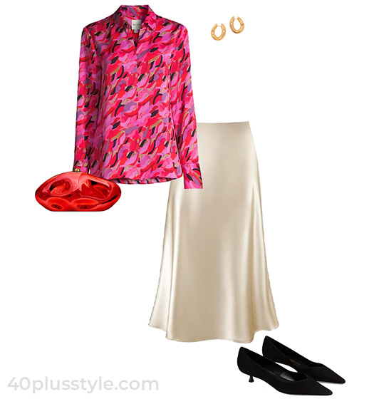 Pritned shirt, satin skirt and pumps | 40plusstyle.com