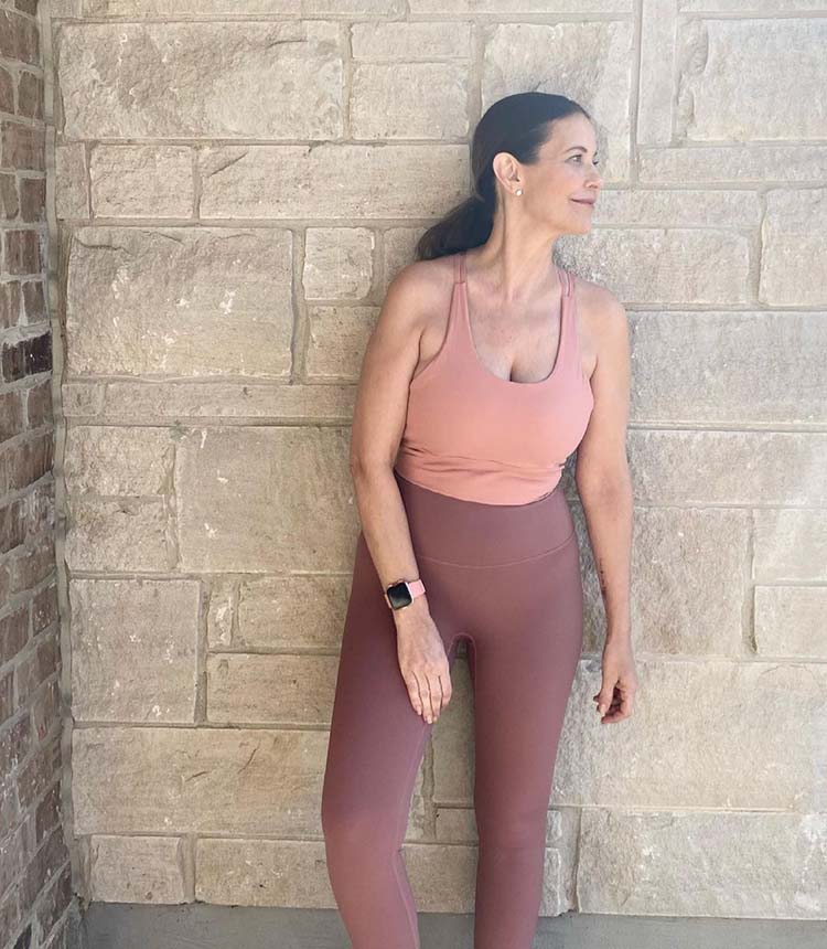 Susan in a pink tank top and leggings | 40plusstyle.com 
