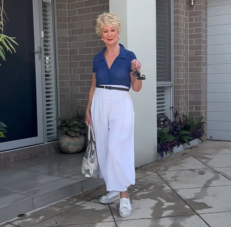 Sharryn wears a blue shirt with cropped pants | 40plusstyle.com