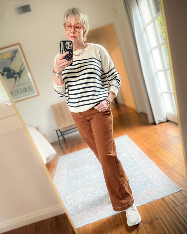 Susan wears a striped sweater and chinos | 40plusstyle.com