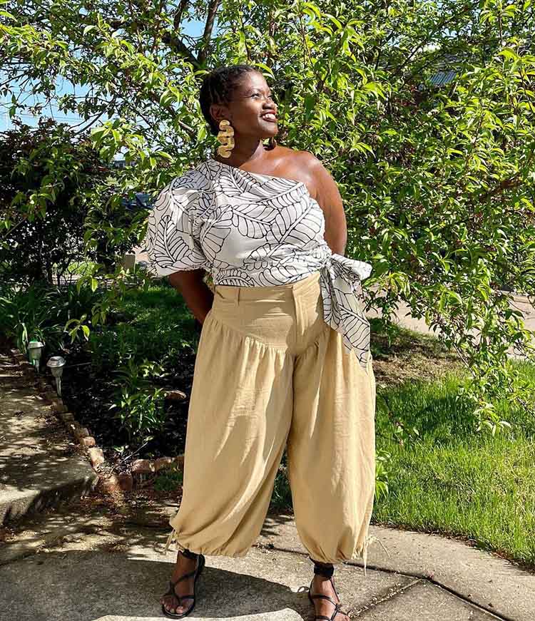 Georgette wears a one shoulder top and loose pants | 40plusstyle.com 