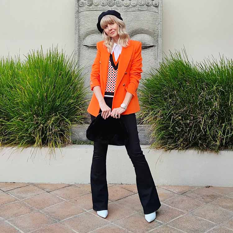 2024 color trends - Melissa wears an  orange, preppy inspired outfit | 40plusstyle.com