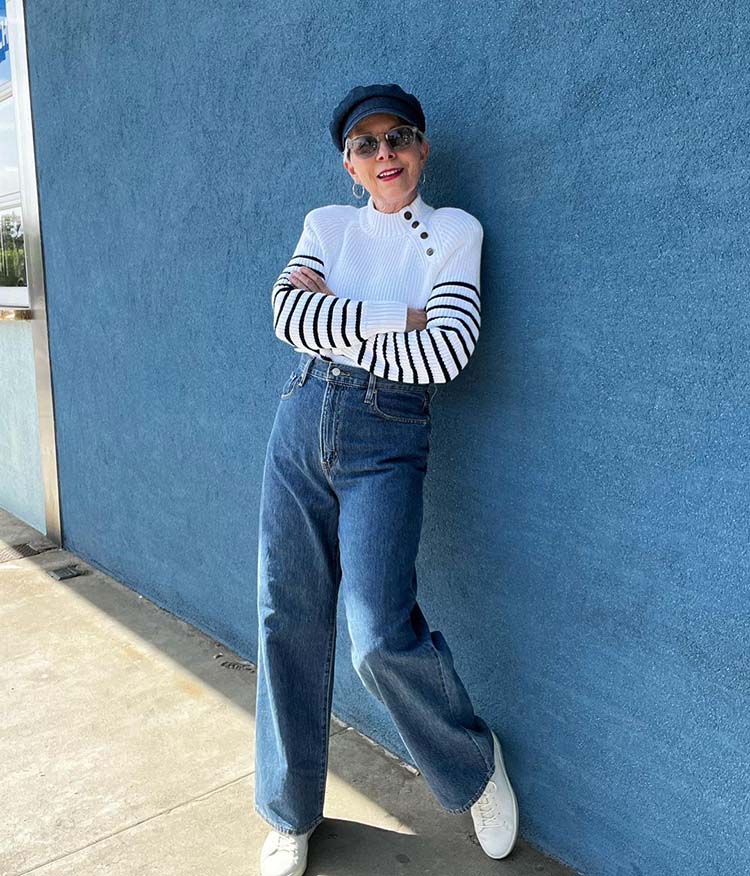 Eileen in a baker boy hat and striped sweater | 40plusstyle.com