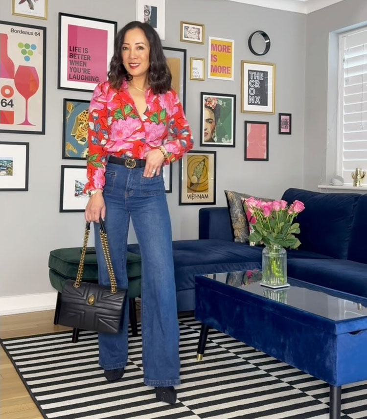 Floral outfits - Abi wears a floral blouse and jeans | 40plusstyle.com