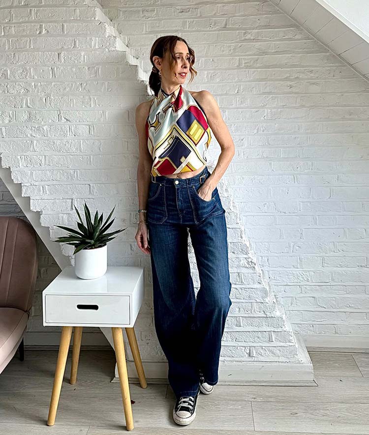 Marie_Louise wears a halterneck top and wide jeans | 40plusstyle.com