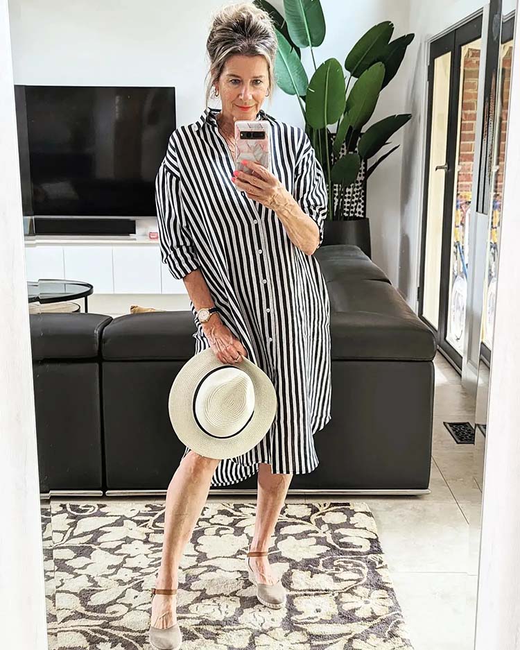 Suzie wears a striped dress | 40plusstyle.com