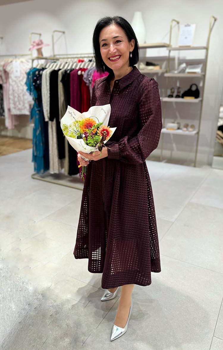 Emms wears a burgundy dress | 40plusstyle.com