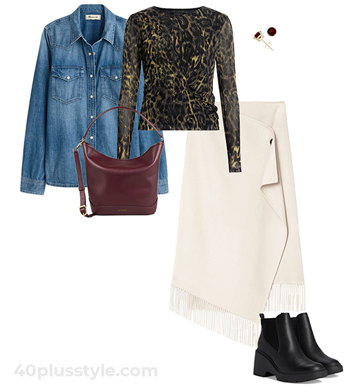 Fall outfit idea: Print top, fringe skirt and boots | 40plusstyle.com