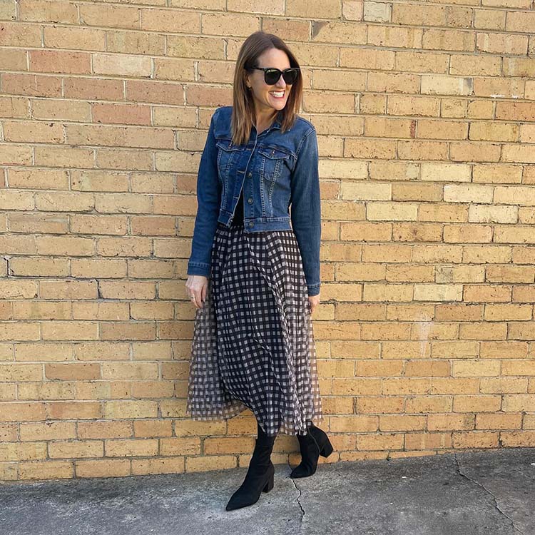 Karen in a check skirt and denim jacket | 40plusstyle.com