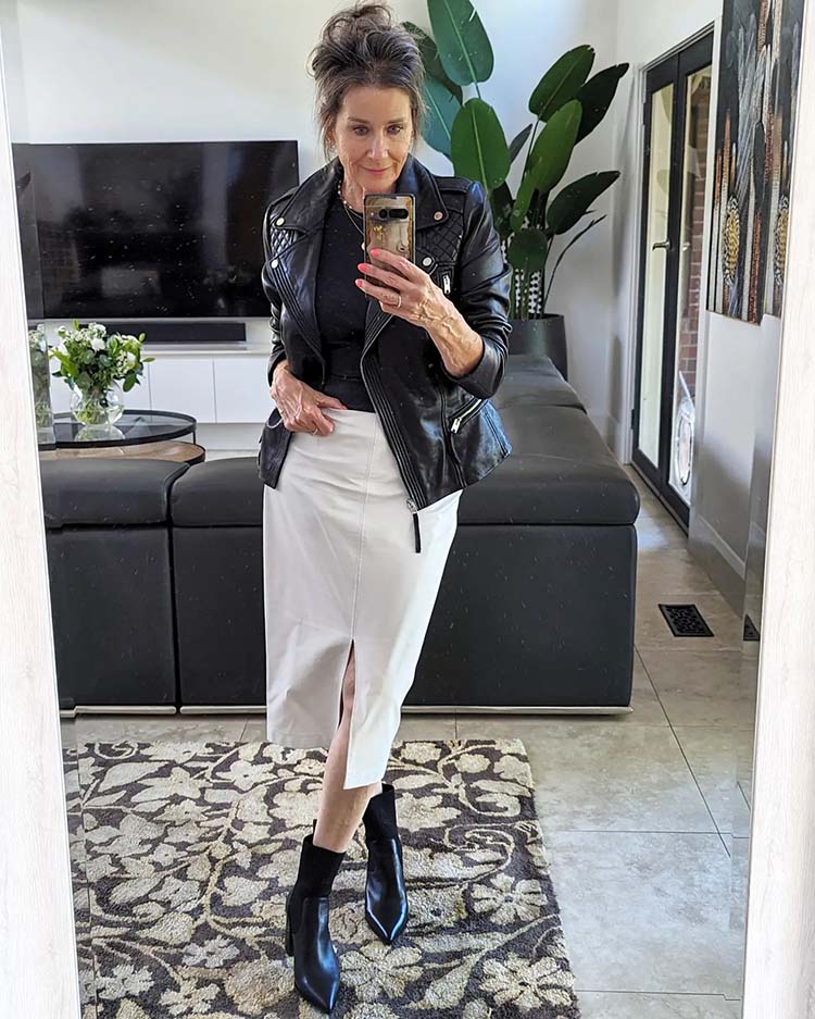 Fall fashion essentials for minimalists - Suzie wears a black and white outfit | 40plusstyle.com