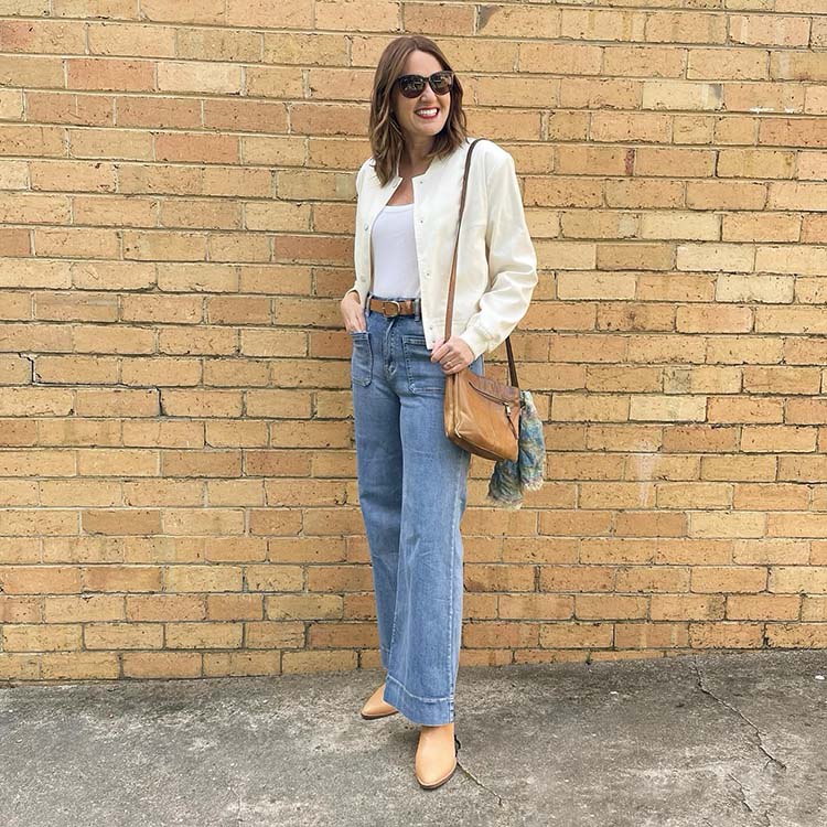 Karen wears jeans and a white jacket | 40plusstyle.com