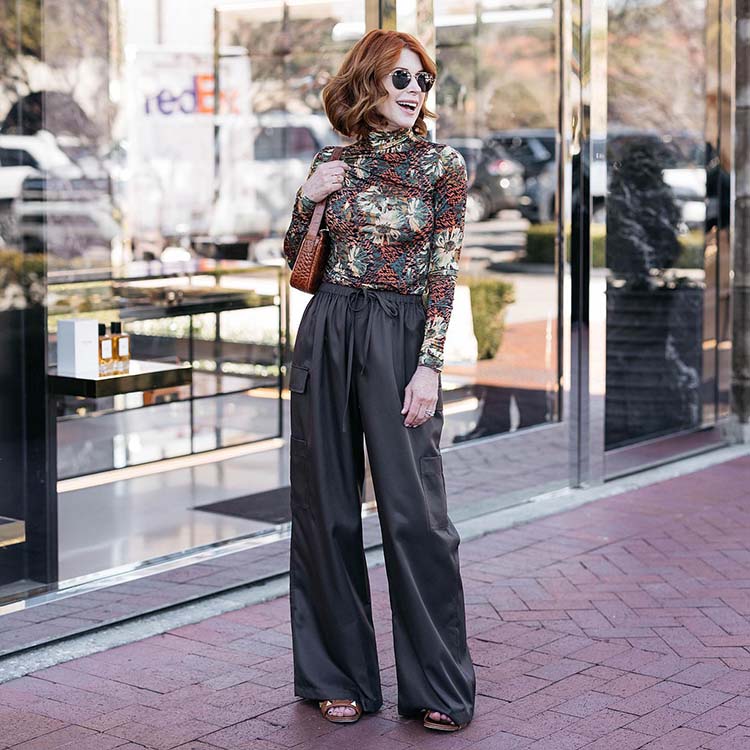 Cathy opts for satin pants and a floral print top | 40plusstyle.com