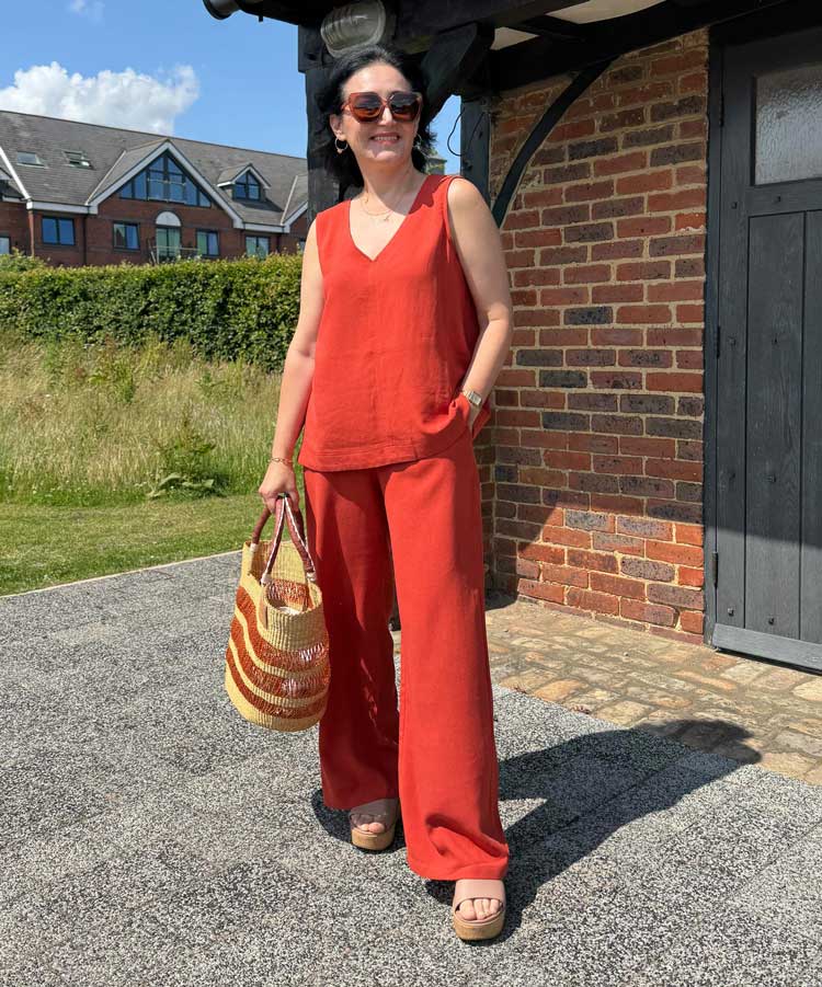 Emms wears a terracotta co-ordinated set | 40plusstyle.com