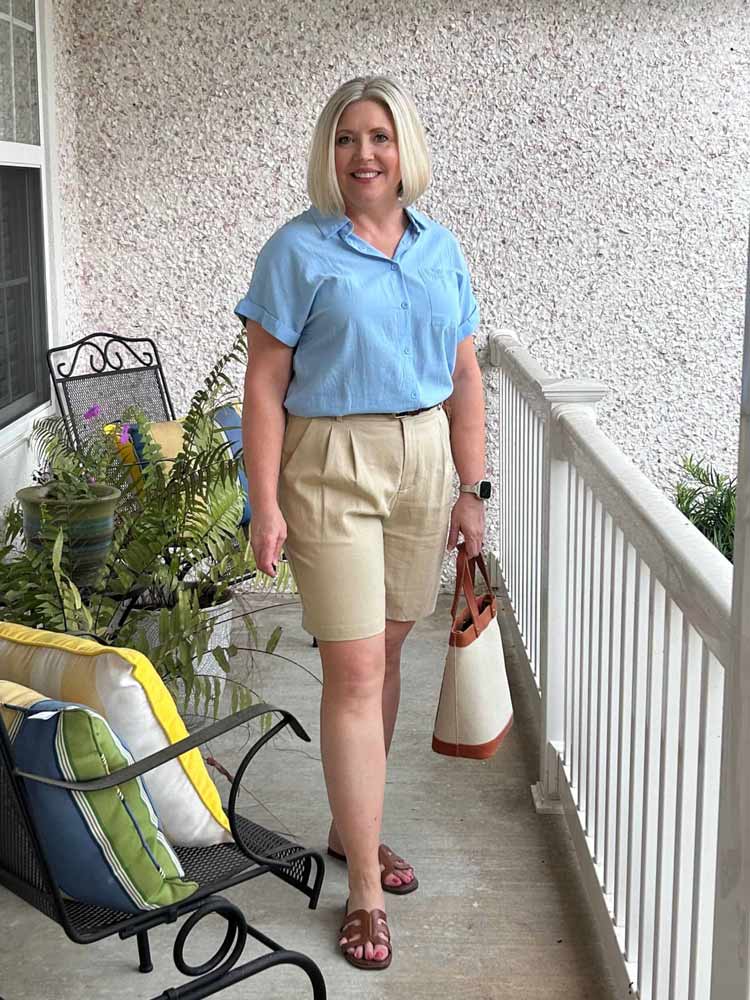 Fonda wears a blue shirt and chino style shorts | 40plusstyle.com