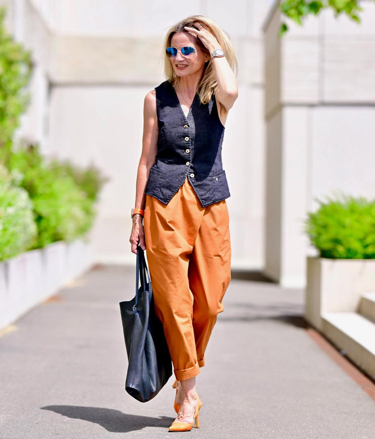 How to wear denim for fall - Yvonne in a waistcoat and barrel leg pants | 40plusstyle.com