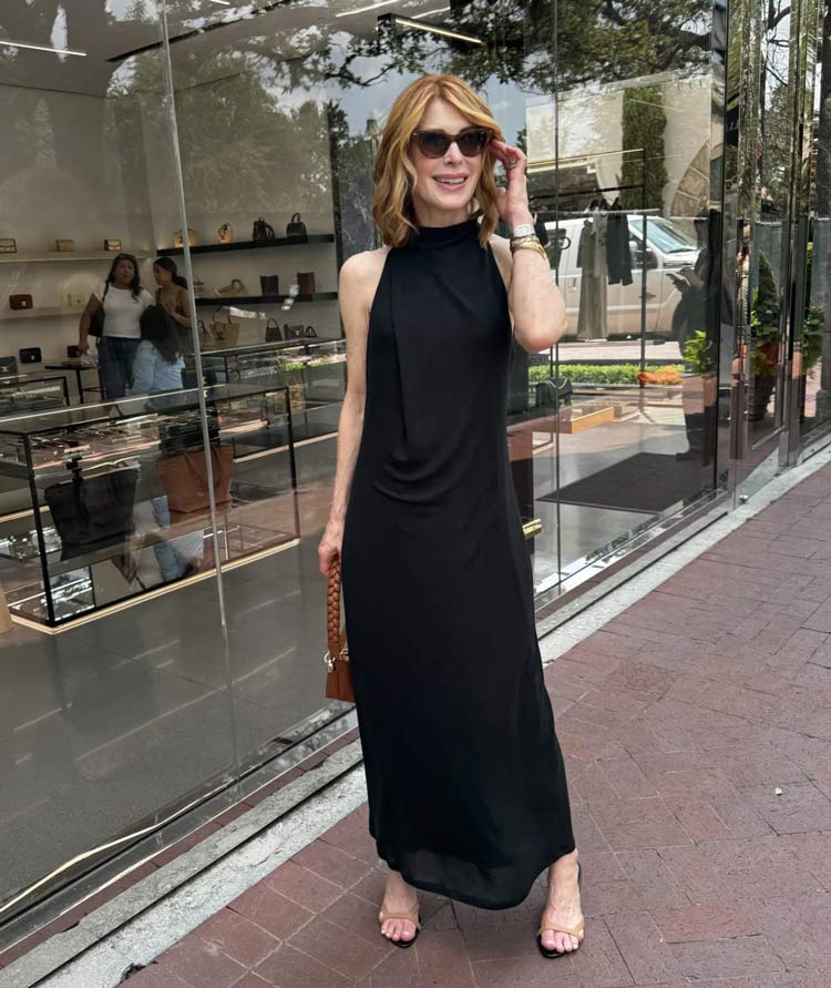 Cathy in a black dress and sandals | 40plusstyle.com