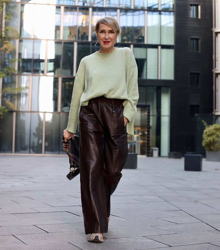 Claudia in burgundy leather pants | 40plusstyle.com