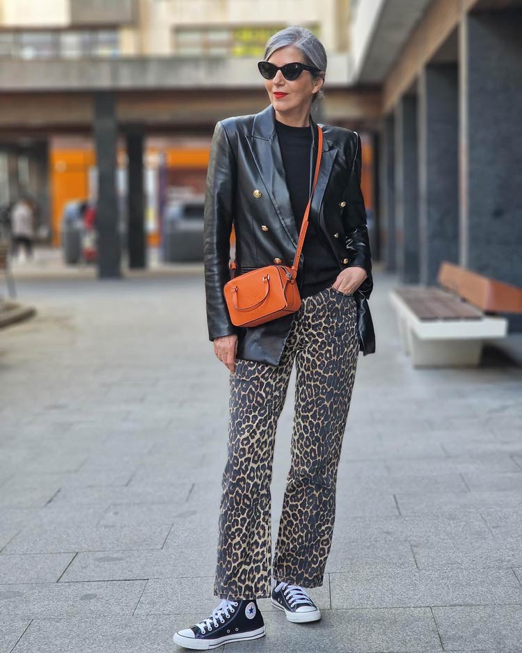 Carmen in print pants and a black jacket | 40plusstyle.com