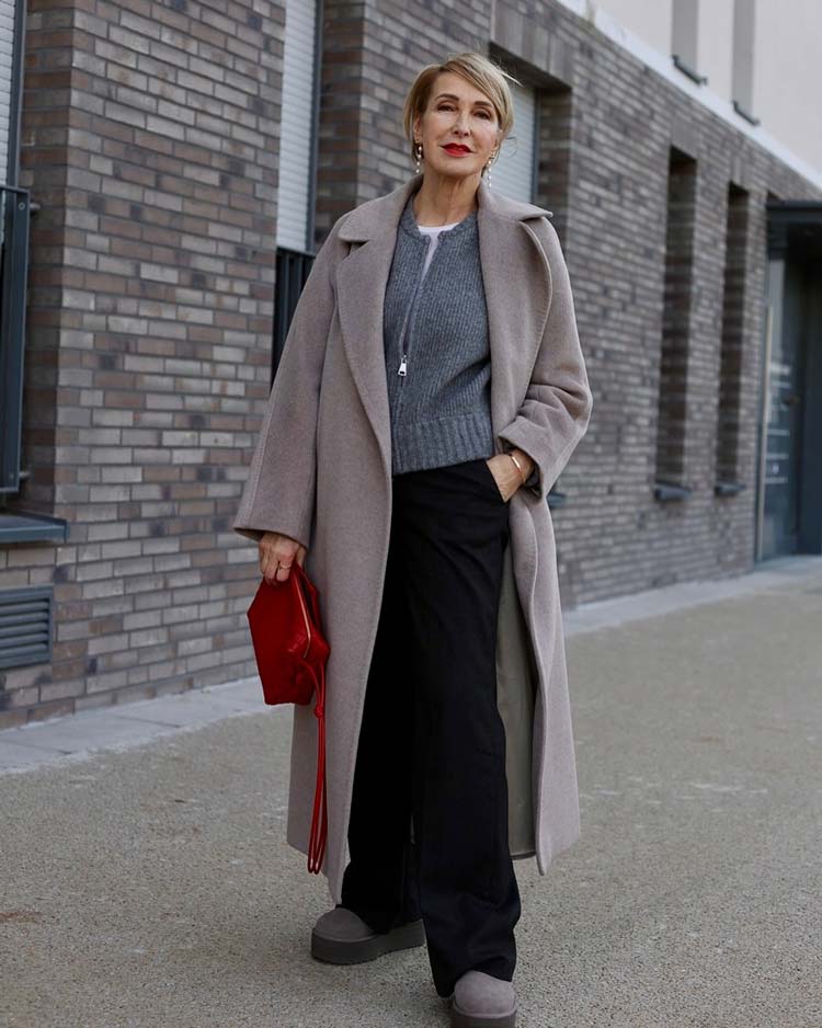 Claudia wears a wool coat and knitwear | 40plusstyle.com