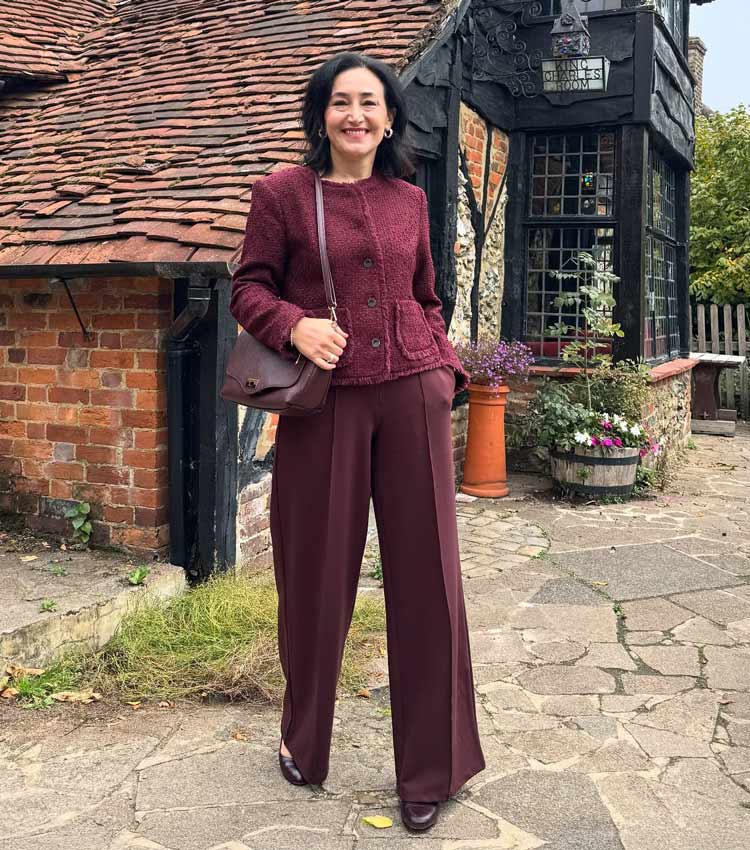 Emms in a burgundy outfit | 40plusstyle.com