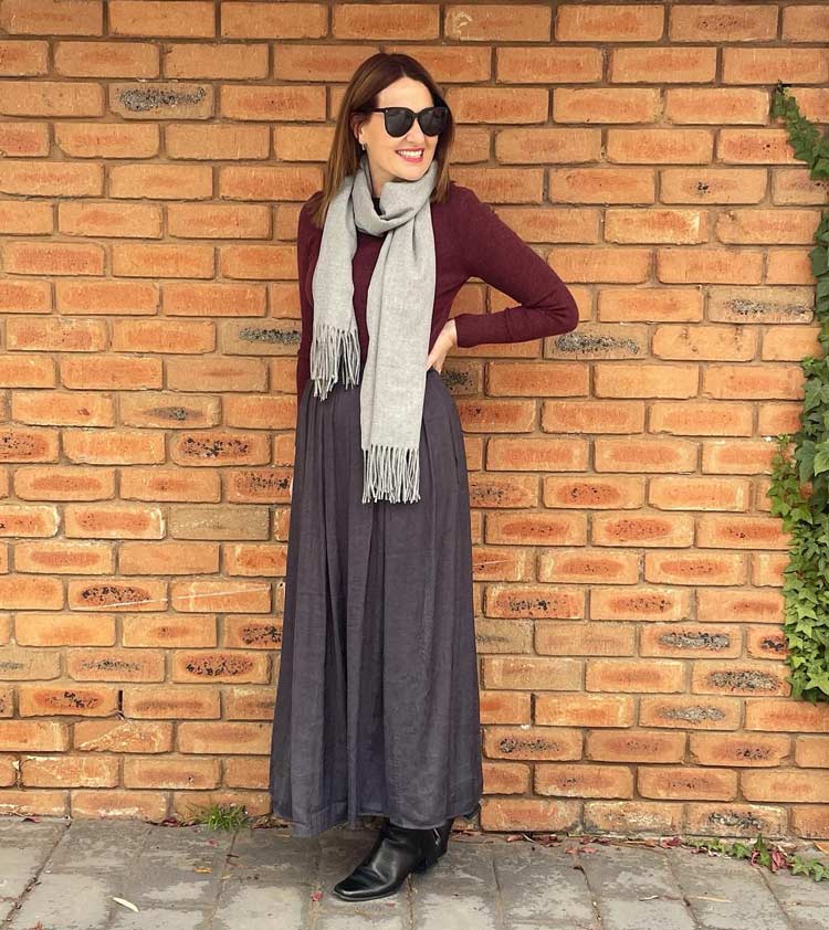 Karen in a gray skirt and burgundy top | 40plusstyle.com