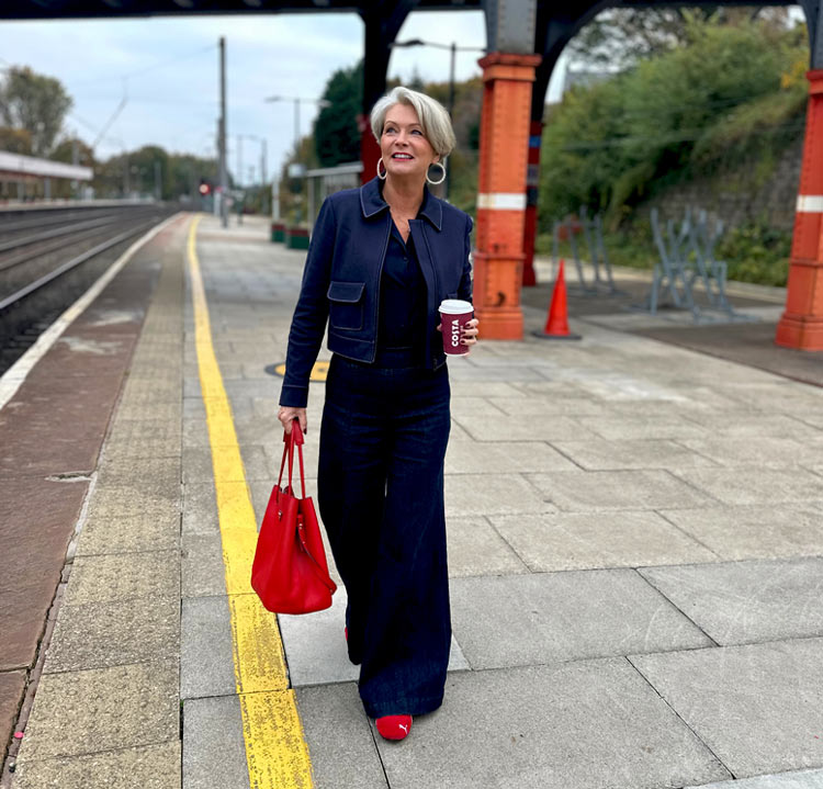 Nikki in a denim and red outfit | 40plusstyle.com
