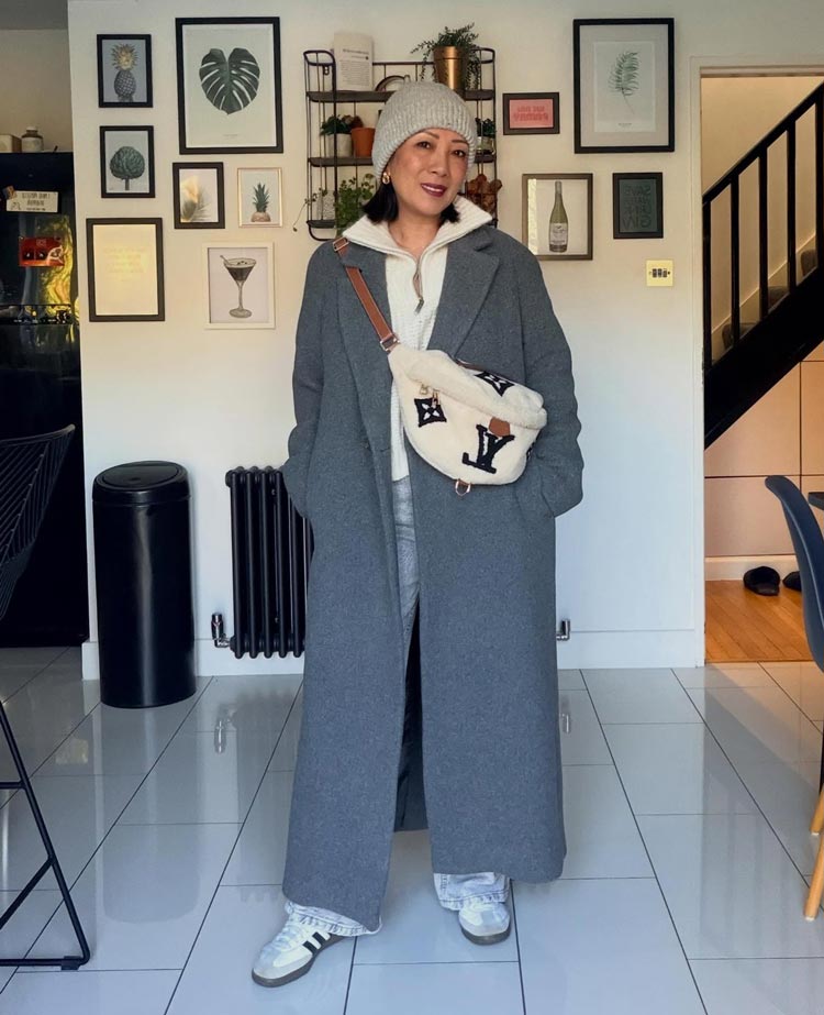 Abi in a maxi coat and sneakers | 40plusstyle.com
