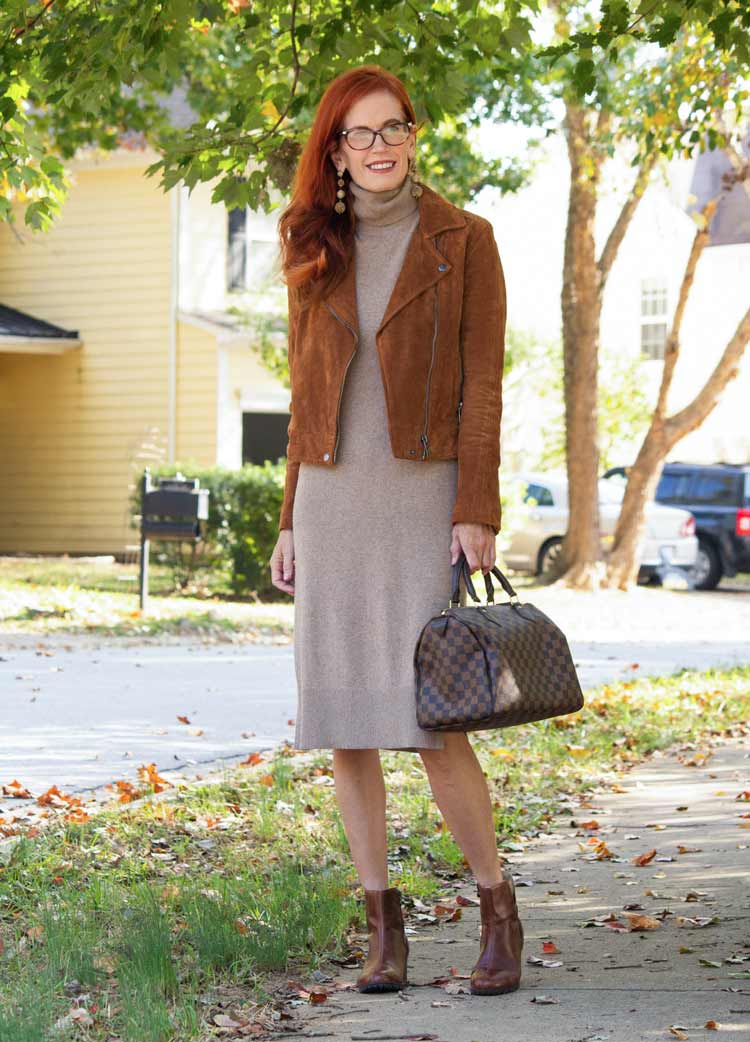 Jess in a moto jacket and sweater dress | 40plusstyle.com