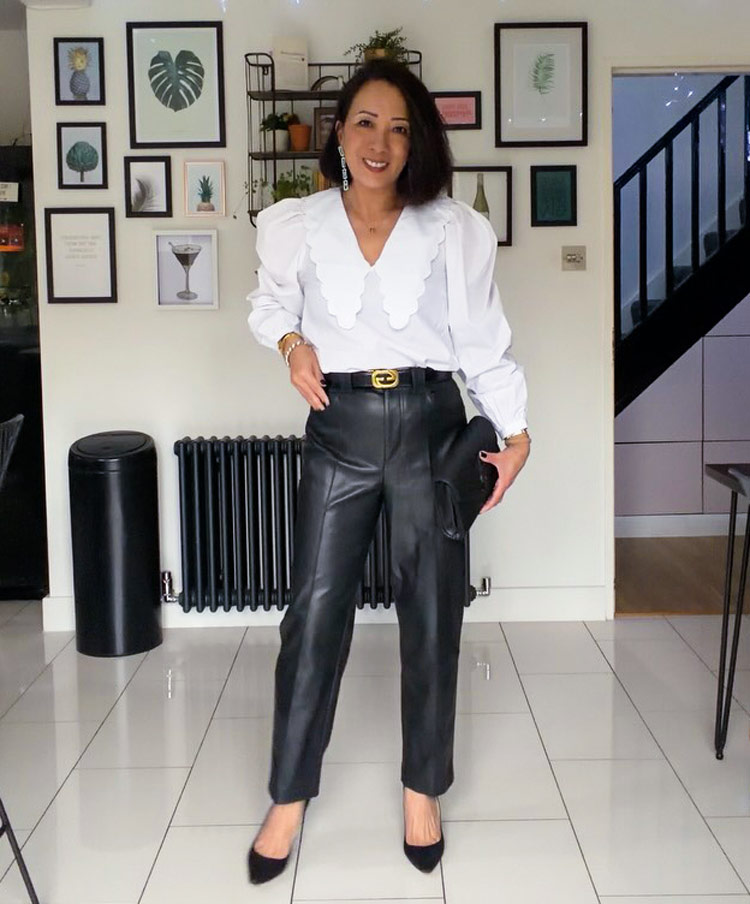Abi wears leather pants with a lace blouse | 40plusstyle.com