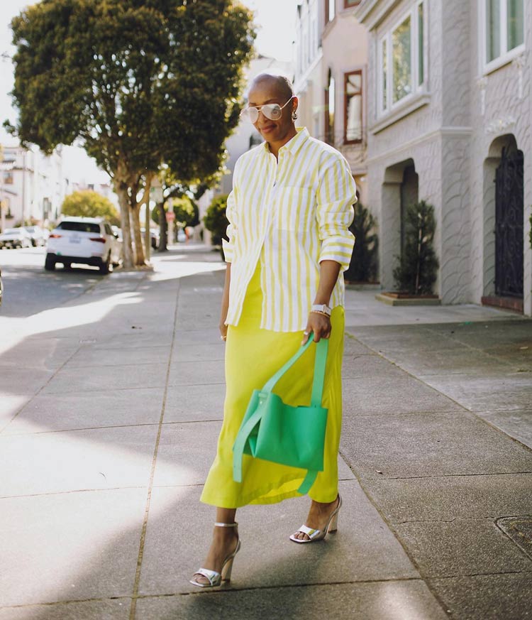 Kim in a vibrant yellow outfit | 40plusstyle.com