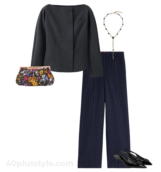 Jacket and pinstripe pants with floral clutch | 40plusstyle.com